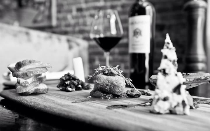 It's National Cheese Lover's Day! Enjoy three different artisan cheeses with pear, gastrique, walnuts, &amp; pan forte.