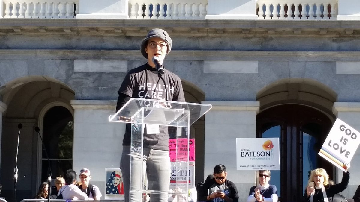 .<a href="/disabilitymarch/">Disability March</a>
I am glad I was able to speak about #disability at #WomensMarchSacramento. Now I'm home recovering.

[image: light skinned person standing behind a podium, speaking. Their shirt says Health Care Voter]