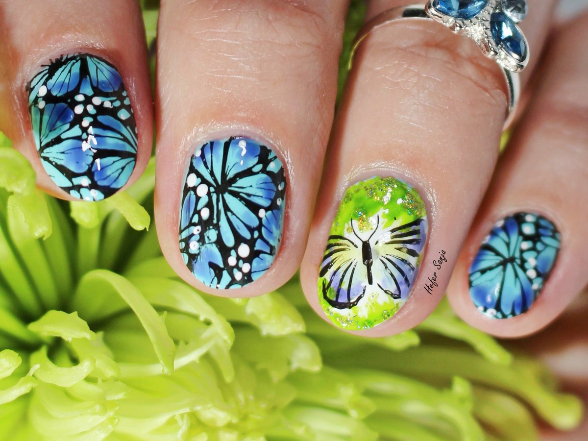 osijek69's tweet photo. Who else can't wait for Spring? I used @bornprettystore BP-X52 plate. #nailart #nailstamping #nailswag #manicure #butterflies https://t.co/HbrQVJJo58