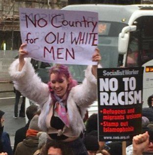 A_Liberty_Rebel's tweet photo. Poster saying "No Country For Old White Men" alongside poster saying "No To Racism".
A better example of the stupidity, hypocrisy &amp; general foulness of the Regressive Left you'd be hard put to find. https://t.co/5DXSZpfiqJ