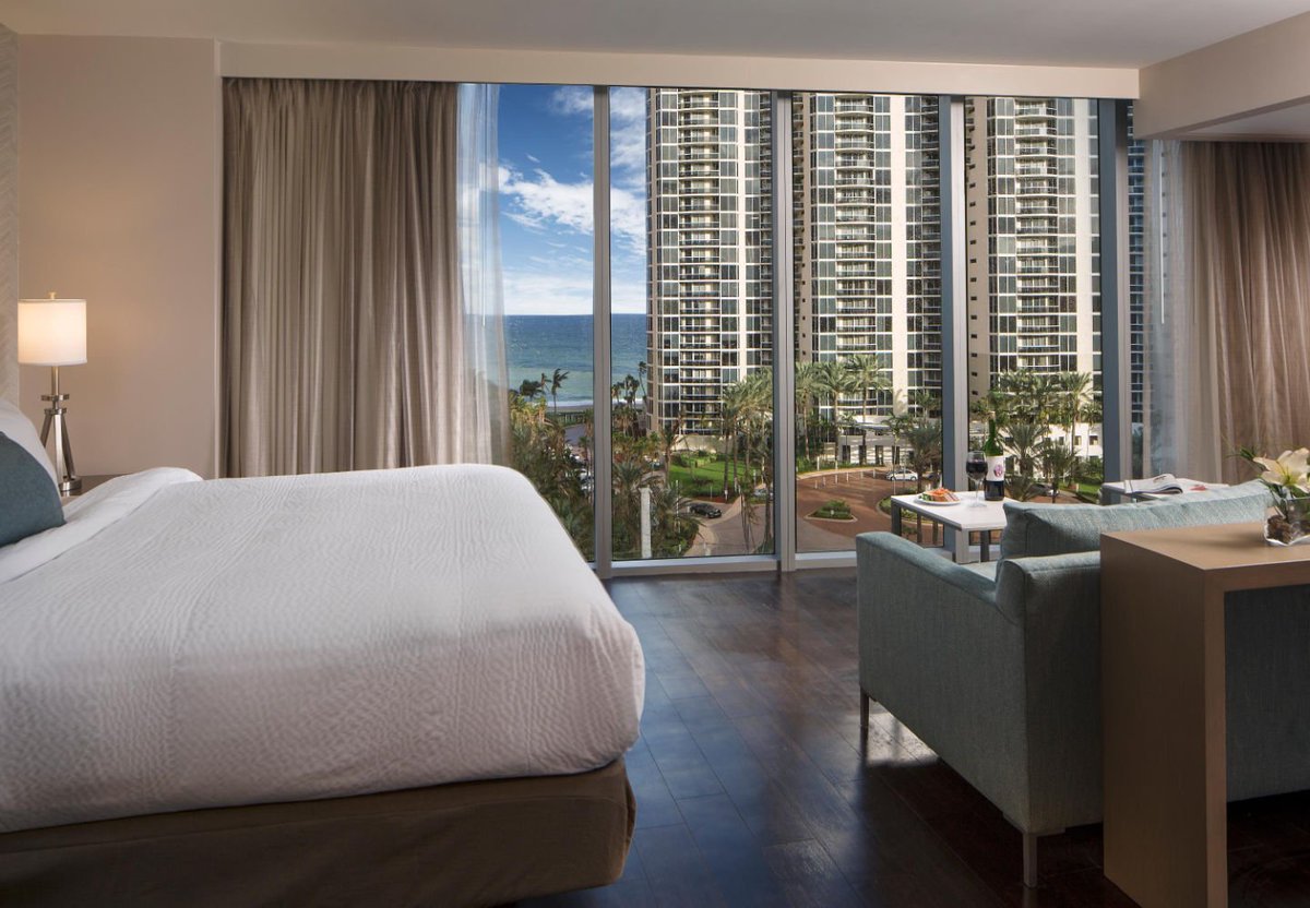 SIBMiami's tweet photo. Relax with ocean and bay views or take a swim in the rooftop pool at the brand new Residence Inn Miami Sunny Isles Beach. #Miami  #VisitSIB #OceanView https://t.co/9foNArT95w https://t.co/4wwCT30fOm