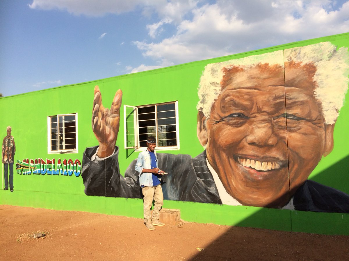 WinnieMabasoFdn's tweet photo. The first of our #mandela100 celebrations is unveiled. A stunning mural painted by self taught artist, @smARTmyk_Views. @ewnupdates @UKinSouthAfrica @SABCNewsOnline @sapeople @MandelaDay @NelsonMandela https://t.co/5ABqq5EnhP