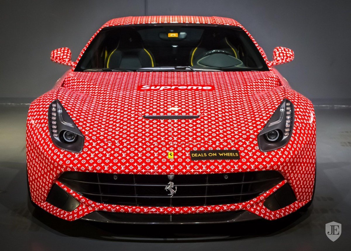 Aura on X: hey if u wanna see the ugliest car wrap in existence, here's a  Ferrari F12 for sale in Dubai right now the Supreme x Louis Vuitton wrap  was designed