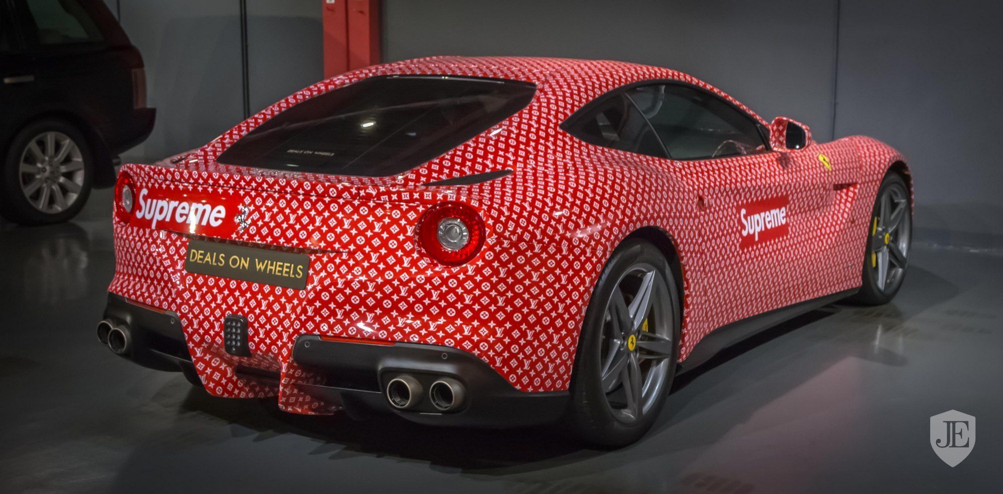 Aura on X: hey if u wanna see the ugliest car wrap in existence, here's a  Ferrari F12 for sale in Dubai right now the Supreme x Louis Vuitton wrap  was designed