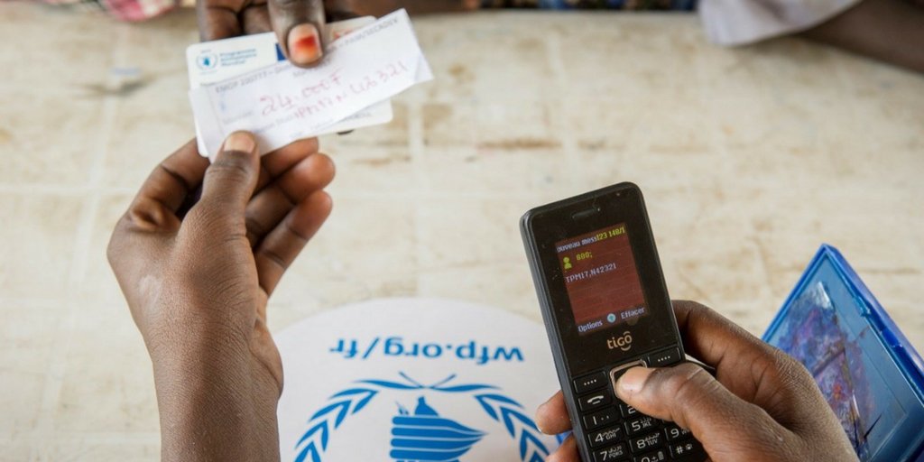WFP's tweet photo. Thanks to our partner @sodexoUSA we were able to design an efficient paper voucher system for food distributions 👉 https://t.co/NTXYSwhrRP https://t.co/DzXNdNOdTS