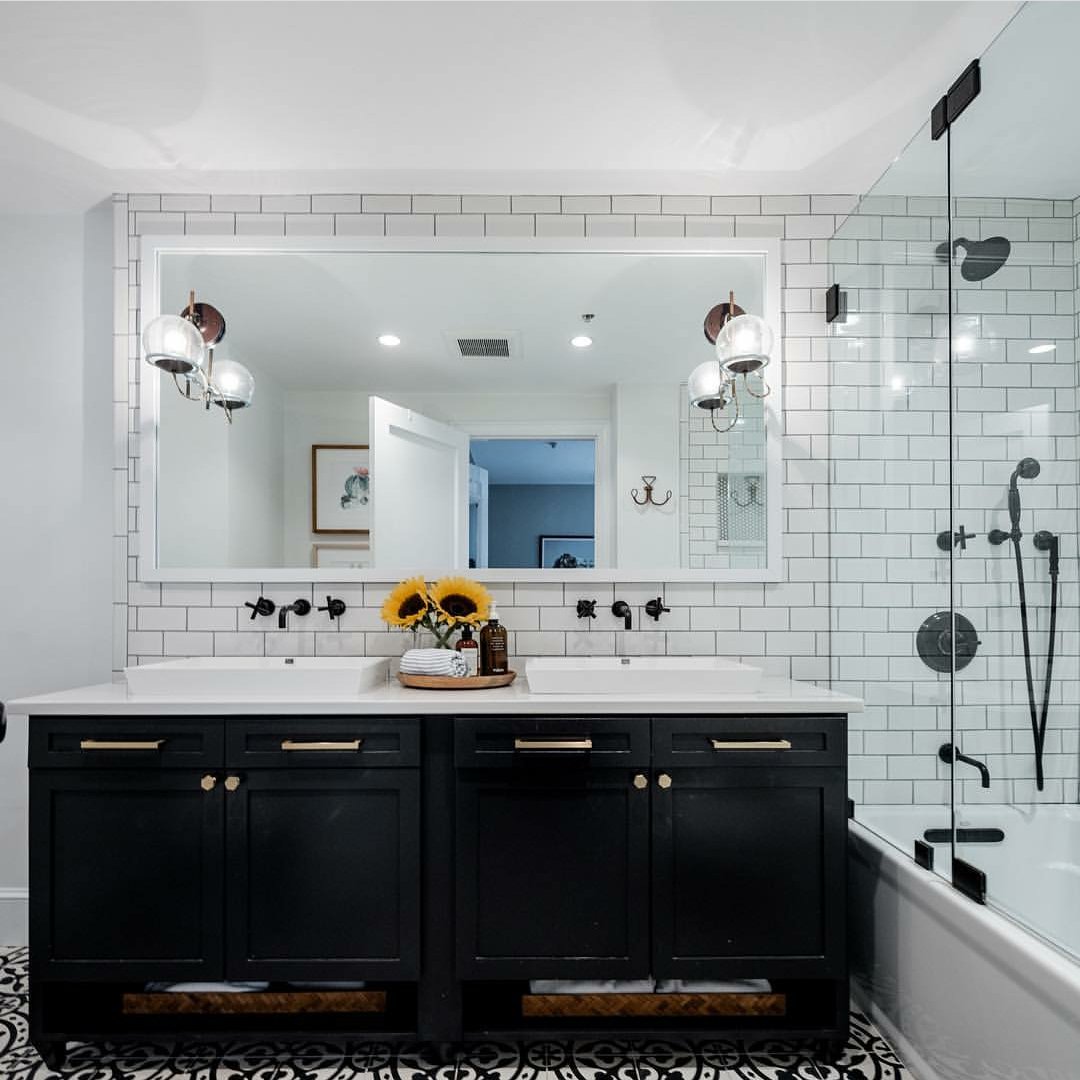 Chic black faucets attached to white tile back splash, Igloo White counter top on elegant black cabinet, and a beautiful tile finish on the floor. This bathroom has amazing detail and overall look!!
lgviaterausa.com