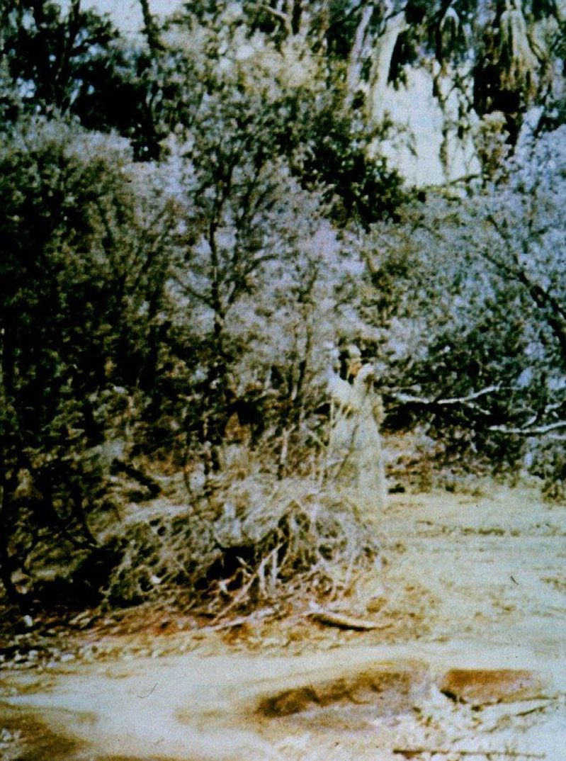 The Spirit of Corroboree Rock was taken by Reverend R.S. Blance in 1959 during a visit the Alice Springs, Australia. Blance claimed he was alone at the time the picture was taken and the apparition was only discovered upon developing the film.