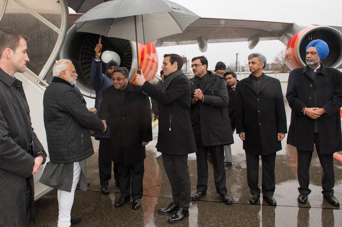 IndiainSwiss's tweet photo. PM @narendramodi arrives in Zurich. Received by Amb. Sibi George.
First visit by Indian PM to #Davos in 20 years. PM would make a keynote speech at the Plenary of the #WEF18, address International Business Council and interact with CEOs. #IndiaMeansBusiness https://t.co/2jFrUN5cTr