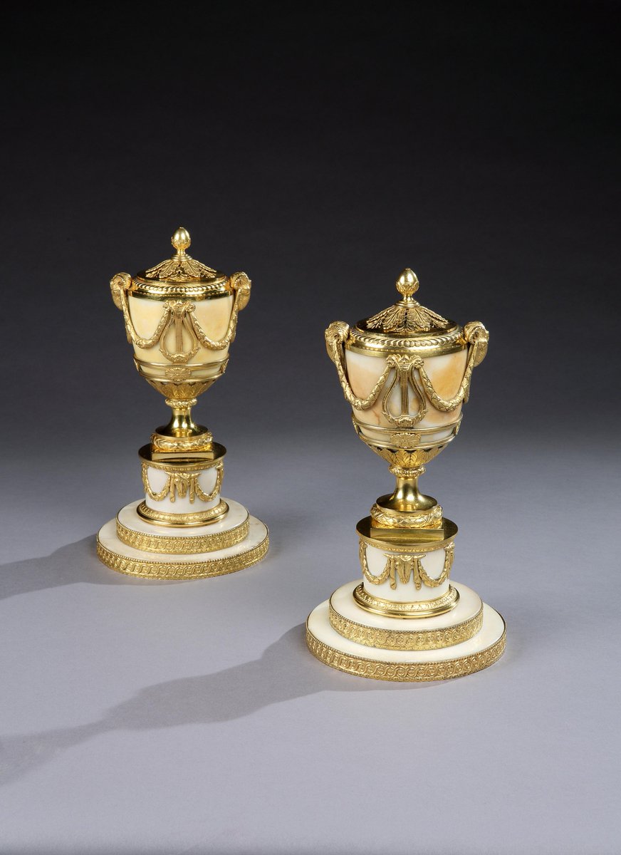 A pair of George III ormolu mounted white marble 'lyre vase' perfume burners by Matthew Boulton, c.1772. View today at The Winter Antiques Show-28th January at The Park Avenue Armory. Open daily 12 pm- 8 pm.