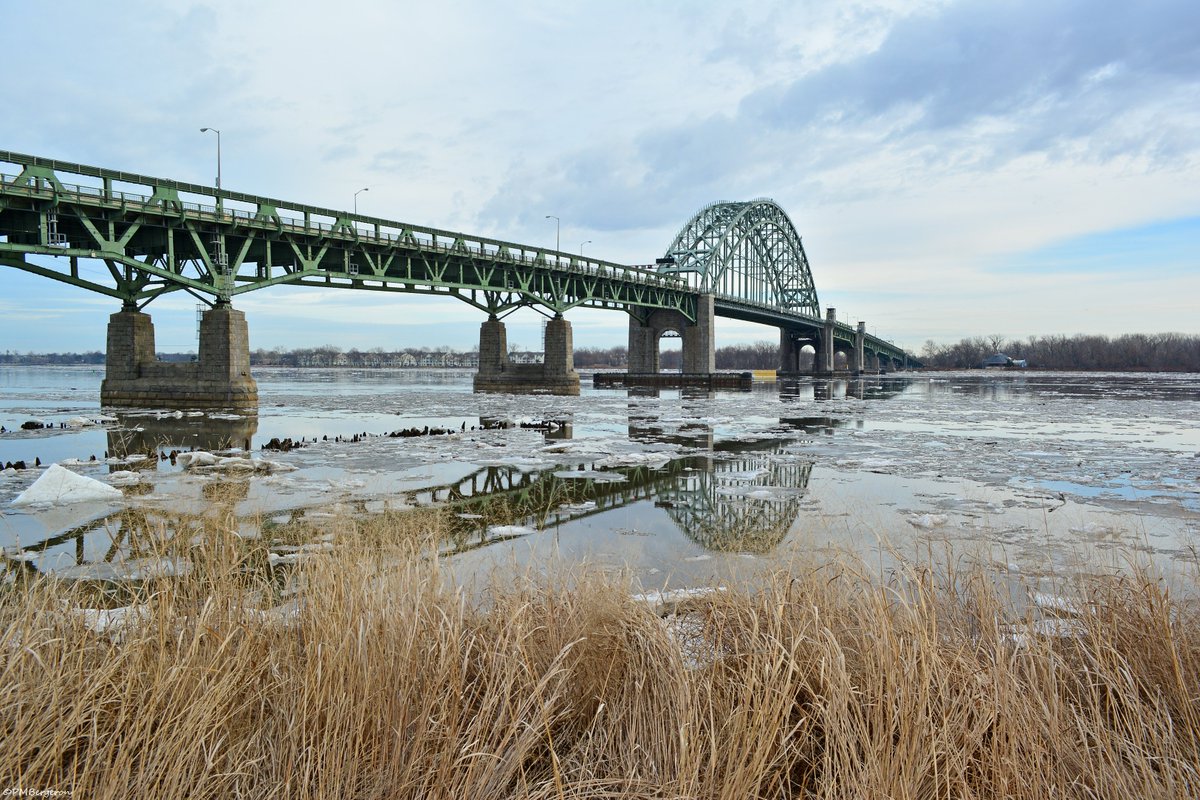 MikeSlickster's tweet photo. Still icy on the #DelawareRiver, as seen yesterday from Lardner's Point in #Philly #TheDelawareForLife Tacony-Palmyra Bridge and an eager beaver #Photography https://t.co/Z1j1UHEDWi
