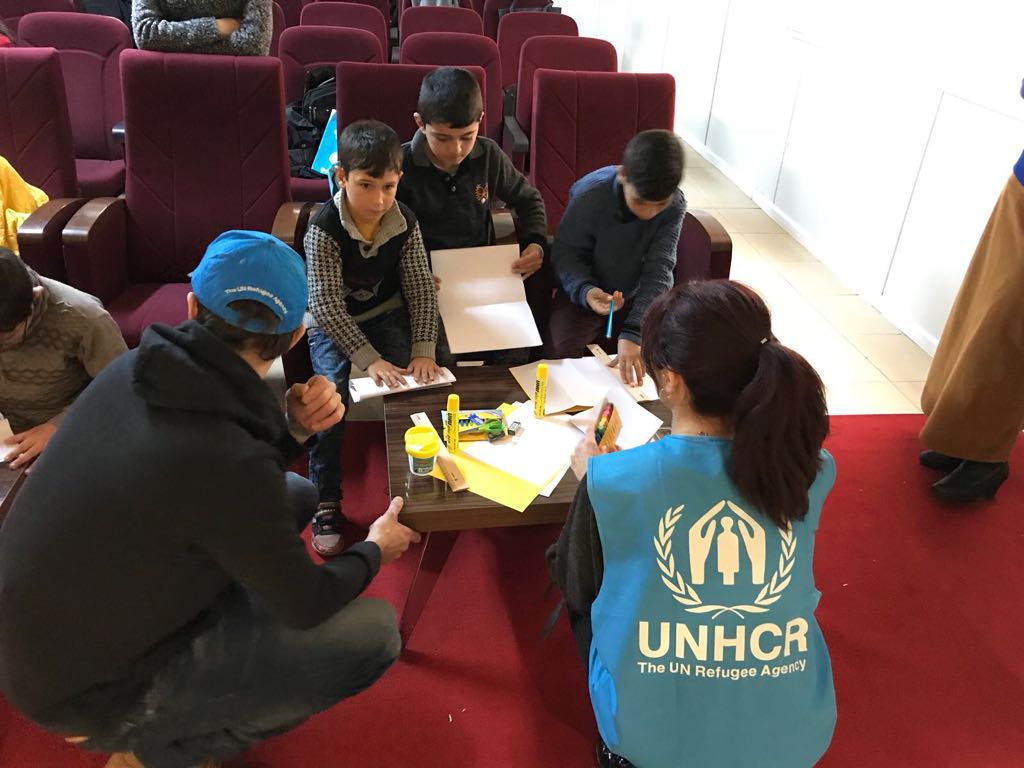 UNHCRTurkiye's tweet photo. Today, children at the Kahramanmaraş refugee camp started the first day of the Virtual Reality workshop where they are building the city they used to live. At the end of the workshop, they will be even able to walk in these cities. #futurealeppo https://t.co/VZssg1LeVx