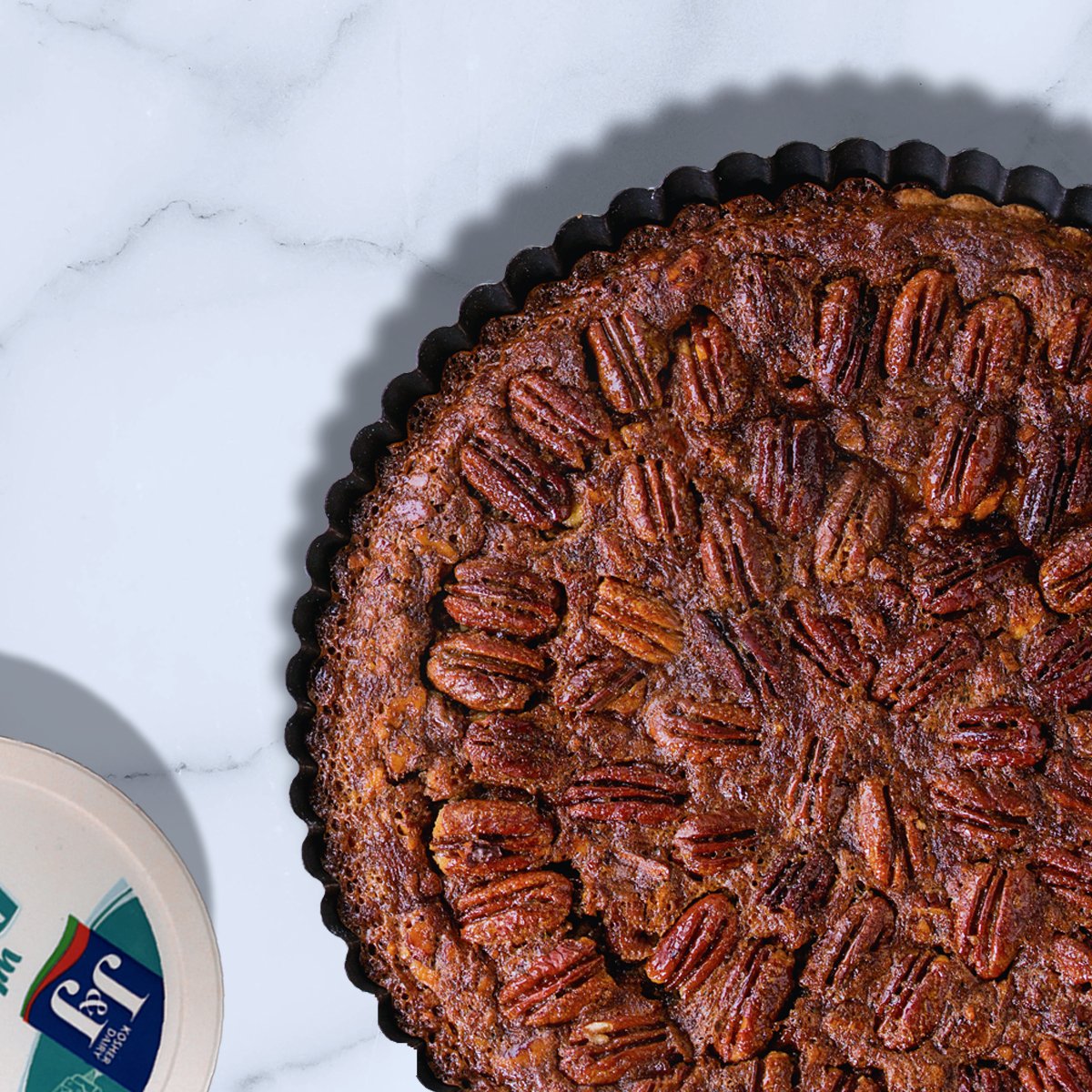 HAPPY NATIONAL PIE DAY! We look forward to celebrating this incredible day every year. This year we are honoring it with a heavenly chocolate pecan pie. CAUTION: You may be subject to gooey melted chocolate, crispy pecans and a whole lotta yum! 🍫 #NationalPieDay