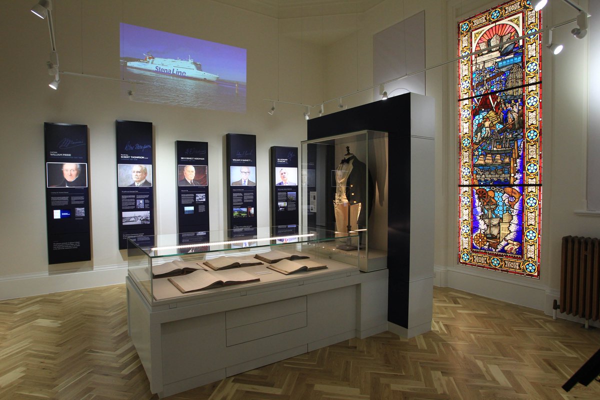 BelfastHarbour's tweet photo. Belfast Harbour has a permanent exhibition in our Harbour Office entitled ‘A Port that Built A City’. We are also lucky enough to be the home of the ‘Titanic table’ and artifacts from the our past. If you would like to visit, please book here - https://t.co/CPOIWYWIYc https://t.co/5j0vZlGyRq