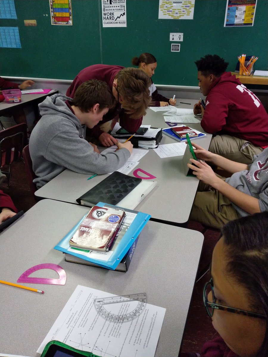 LMoneyMath's tweet photo. Expert on #reflections Tyler helps out freshman Jacob. #NeverBoringMath @Trinity_Titans #mathisasocialsubject #TitanPride https://t.co/WdeZsMLF70