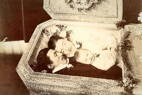 33. Three in a casket: Emil, Mary, & baby Anna Keller.In 1894, Mary Keller shot her husband and child, then committed suicide in Auburn, New York.Mary was suffering from mental illness and her husband was very devoted to her till the end.A sad story with a beautiful picture.