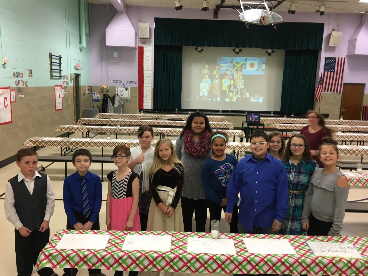 Student servers and greeters preparing for school -community spaghetti night.