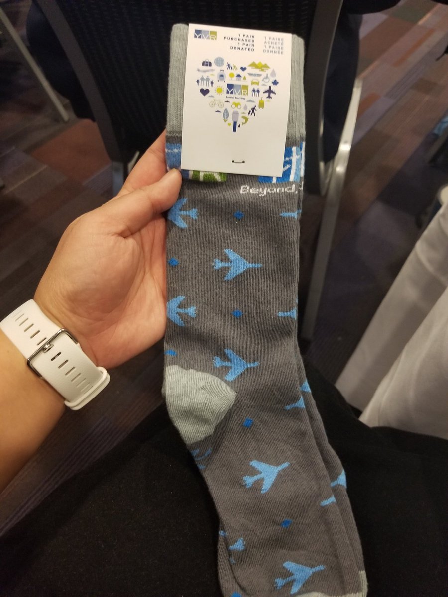NatashaCarpio's tweet photo. Thank you @yvrairport & @BoardofTrade for the socks! π #YVRSocks https://t.co/XMDqZsnQw5