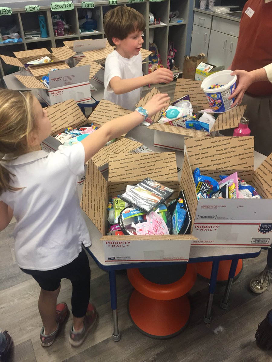 MrsGraybealSTS's tweet photo. 2nd graders spent their afternoon with the Raleigh Civitan Club packing care packages to send to soldiers overseas! @StTimsRaleigh https://t.co/r9nx89Qo94