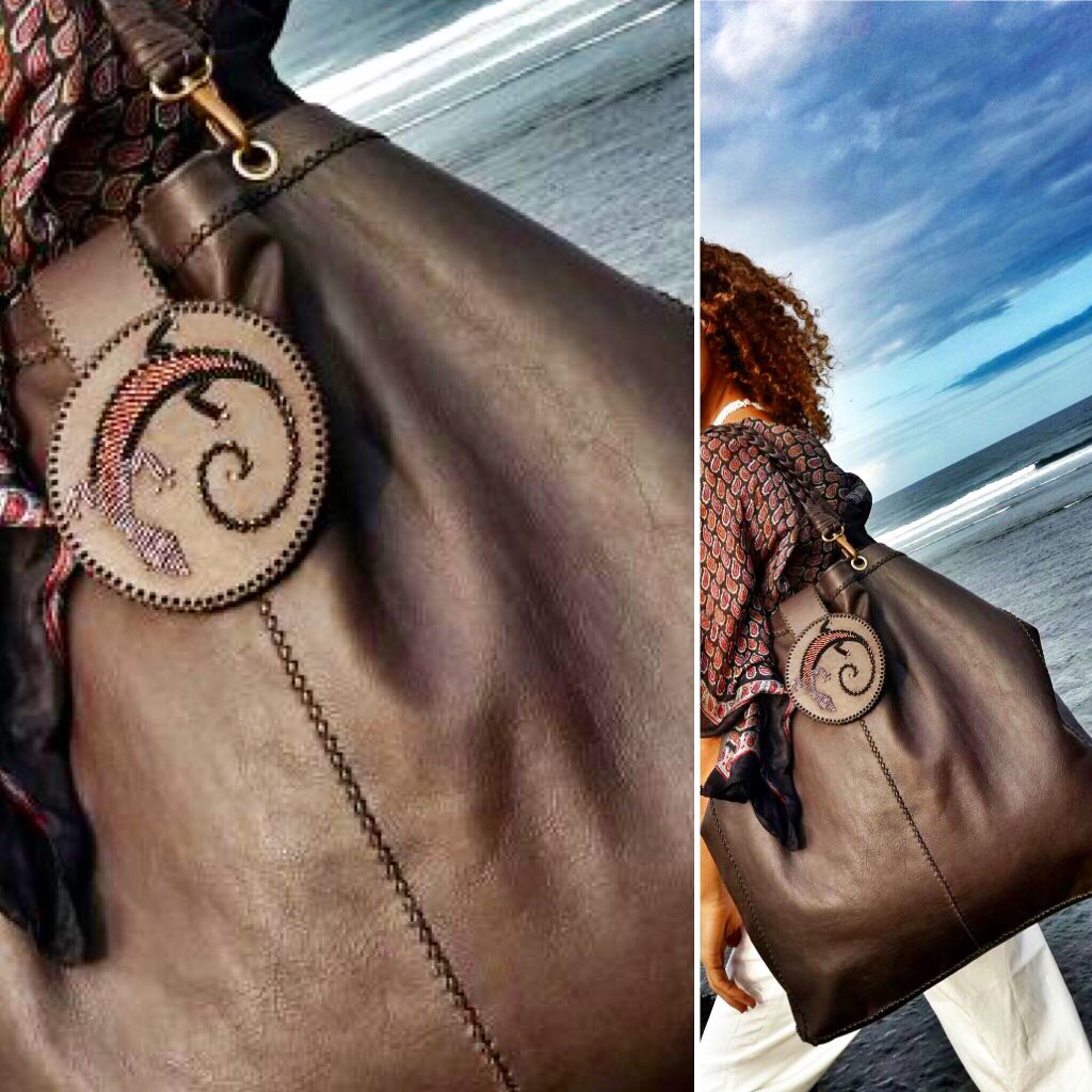 Zinjdesign's tweet photo. #handbags. Made from hard-wearing, Kenyan beef leather and lined with a soft, goat-skin lining. 100% glass beads, and solid brass hardware.  Hand-stitched to uphold our ‘lifetime’ guarantee. #dogcollars #safaribelts #handbags #handmadeinkenya #leather #leatherbelts https://t.co/hVphy46tmB