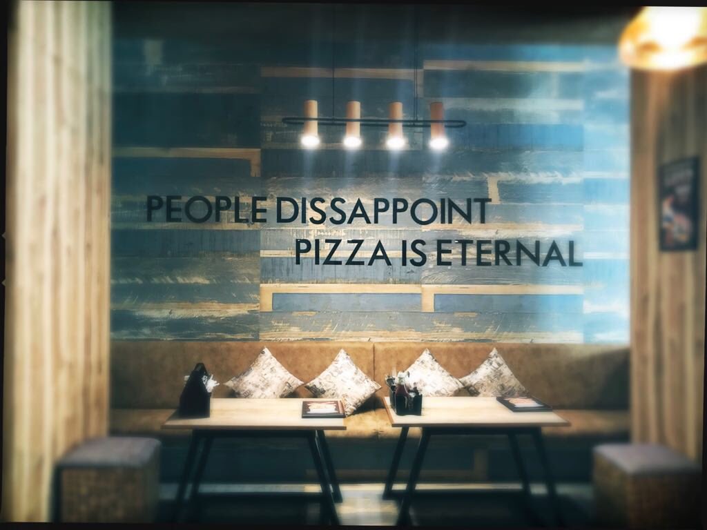 Saburbanette's tweet photo. Lovely little place, newly opened opposite Ambani Hospital in Andheri. Go check it. 
(The pizza is eternal, by their own admission) https://t.co/LDMRwaFxAp