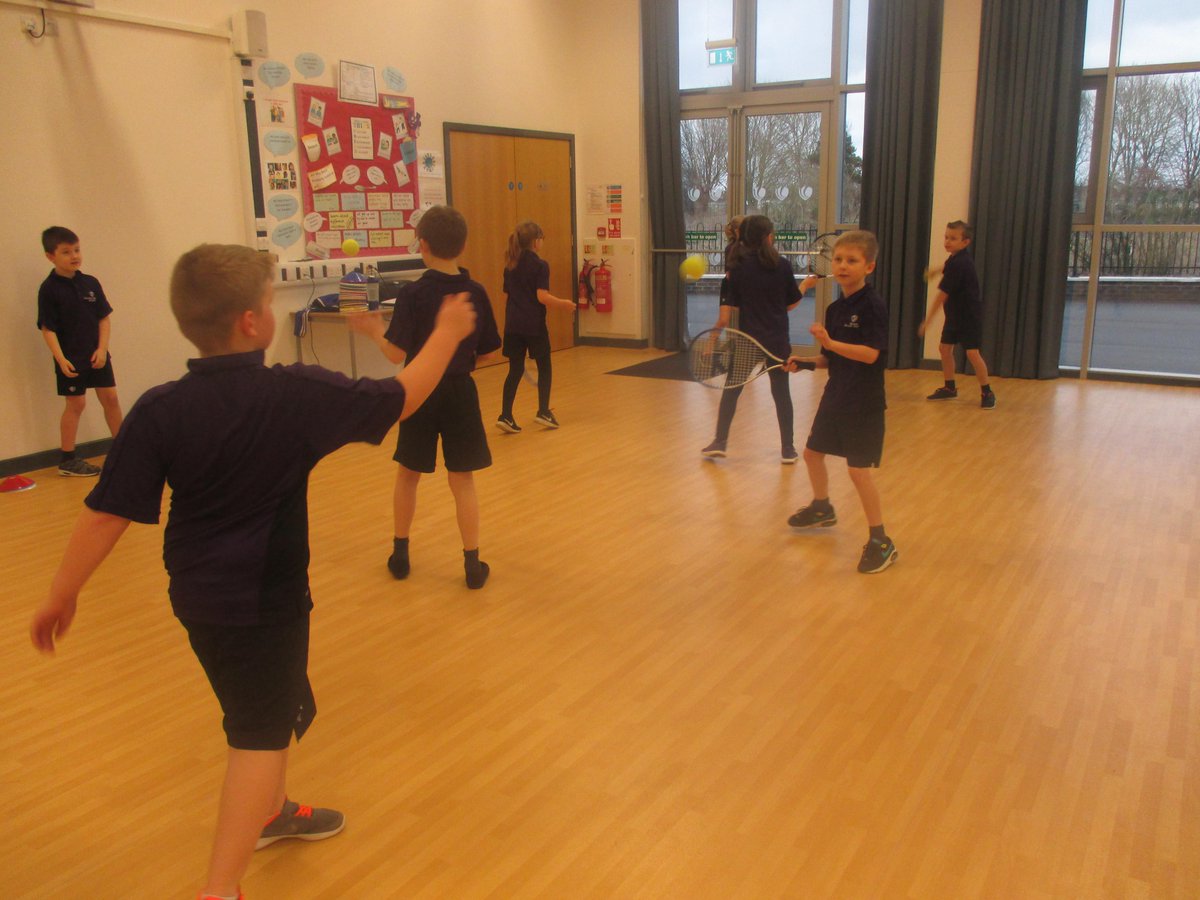 BeaconAcad's tweet photo. Today Y4 had another exciting PE lesson. Mr Parker chose 2 star pupils for their technique and focus. They practised overarm and underarm serving and shots with a partner. @JBSportCoaching #tennis #activebursts #PE https://t.co/mmZl2PAw1l