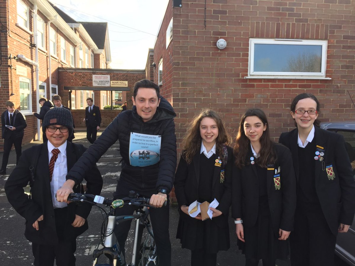 Mr Tatham has been cycling around school to promote our whole school read, 'The Giver' by @LoisLowryWriter  Come into the library and borrow a copy today! #BeaumontReads <a href="/beau_eng/">Beaumont English</a>
