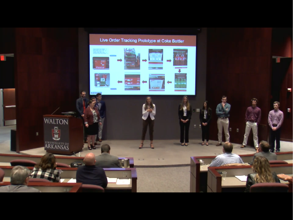 supply_chain's tweet photo. Innovative Walton College supply chain students worked with NCR, Coca Cola and Walmart using computer vision and AI technology to enable accurate order picking.  Read more here:  https://t.co/WPuY1apOTU https://t.co/crgr7D1YAD