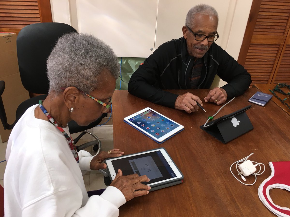 Earl and his wife soaking up lots of new information yesterday at our Digital Drop In.  Information is power!