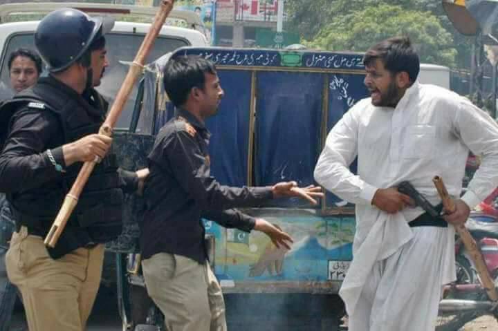 FaizMBaluch's tweet photo. Jama’at Islami Student wing goon, with pistol and stick, roams free while Pakistan Punjab police arrested and put behind bars hundreds of innocent Baloch and Pashtun students. #LetStudentsStudy https://t.co/kRIp7ZXe9J