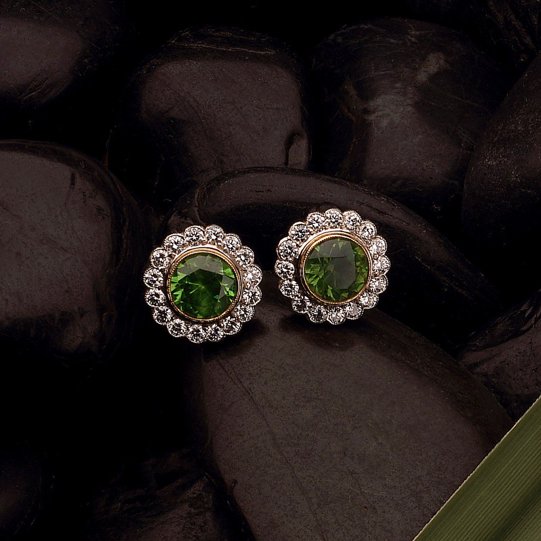 Distracting ourselves from the rain and dark skies with these #gorgeous #peridot and #diamond cluster earrings. 
The colour of #summer! 💚