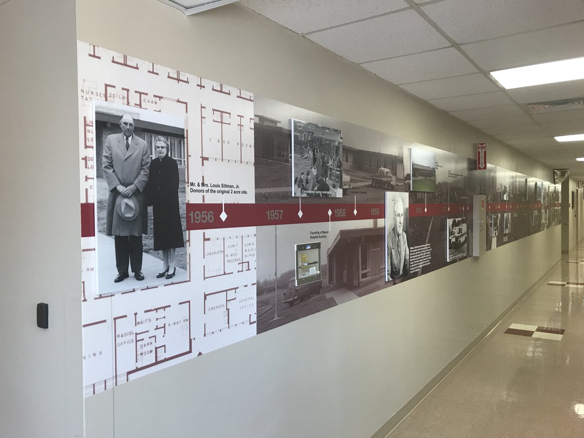 cmfigroup's tweet photo. After a few #signage projects at Mason District Hospital, we noticed many blank, white walls throughout their facility. We could see they had history and a story to tell. We came up with a solution, and here's the finished product. #heritagewall #60thanniversary https://t.co/AvXsjM8FDB