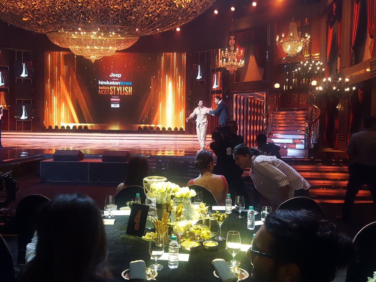 HT Most Stylish Youth Icon Male is @Varun_dvn and he makes quite the entrance on #CyrusSahukar's back