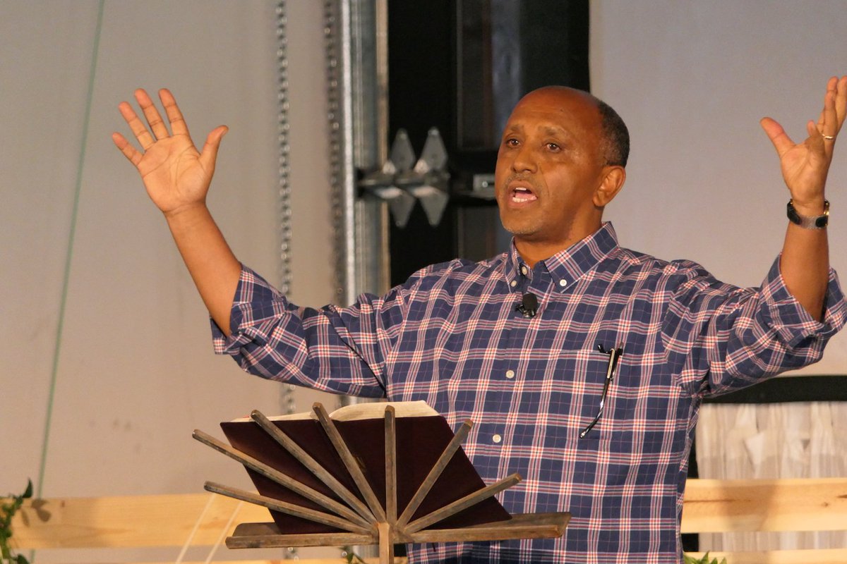 SimplyJesusTeam's tweet photo. Here's Tamrat Layne at #SJ2017. A former communist and atheist, Tamrat deemed any form of faith in the supernatural an opium of the human mind. That is, until Jesus met him in his prison cell, and gave him new life. Watch his talk and listen on our website. #TBT https://t.co/91UVYFXm37