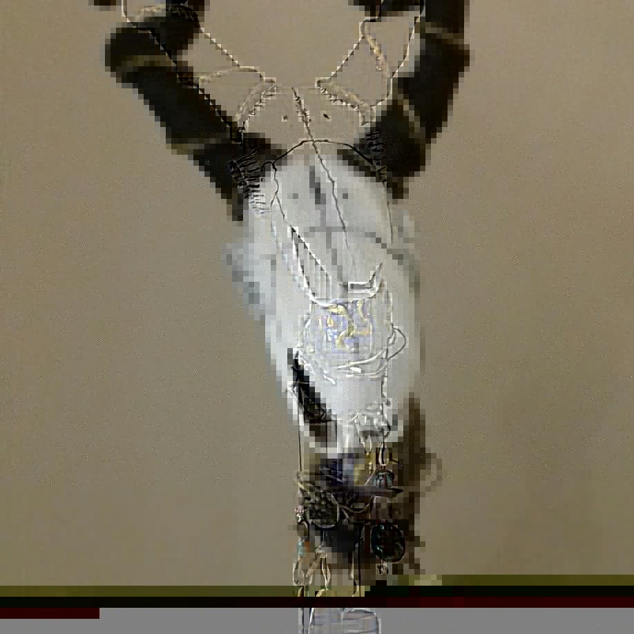 Prospers's staff made for a production of The Tempest for the Bridport Shakespeare Company.  Paper mache skull  and a twisted willow staff.