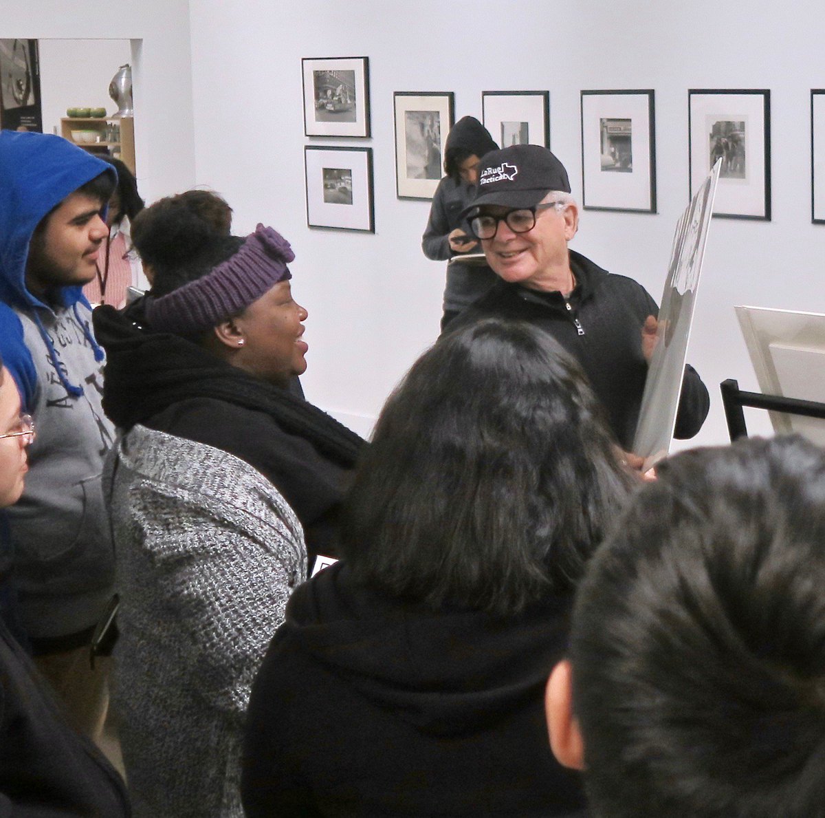 PDNBGallery's tweet photo. Gallery Director, Burt Finger, speaking to a class visiting the Gallery last Thursday. He certainly had the students' eyes & ears as he explained photography's importance in making it possible to see history in intimate moments that detail what people did with their lives. #PDNB https://t.co/deZDZnMUaT