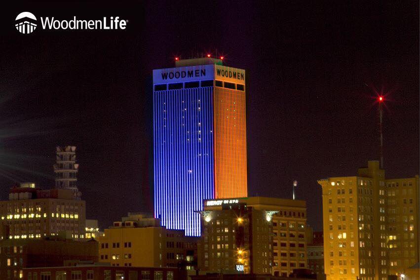 KYHighFootball's tweet photo. The WoodmenLife Tower in Omaha, Nebraska tonight, blue and orange, in memory of the victims of Tuesday's shooting at Marshall County High School. 

#MarshallStrong https://t.co/pLBpZkwrDm
