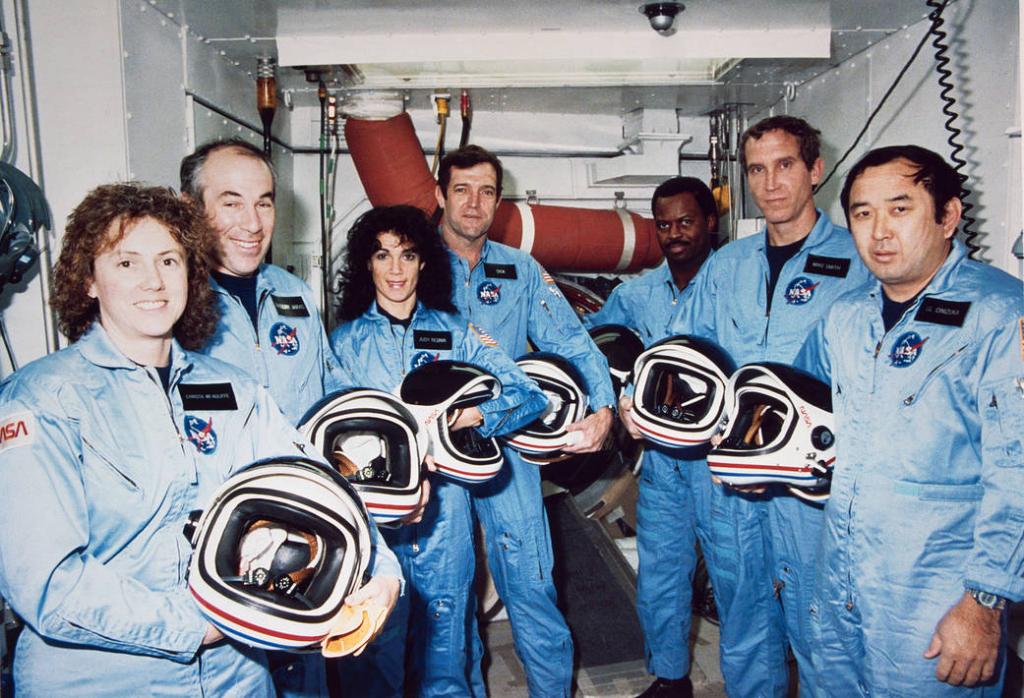 NASAhistory's tweet photo. Today we honor and remember the crew of STS-51L who died in the Challenger accident in 1986: (left to right below) Christa McAuliffe, Greg Jarvis, Judy Resnik, Dick Scobee, Ron McNair, Mike Smith and Ellison Onizuka #NASARemembers #DayOfRemembrance https://t.co/vCtxsmKTcr