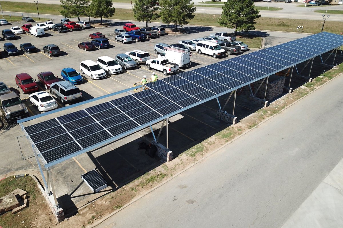 TNCleanFuels's tweet photo. Check out this new solar canopy charging station built by the @CherokeeNation with @FRERenewable in @Tahlequah OK. It's the first of its kind in the state! It charges 8 vehicles at a time and provides 58,000kWh of electricity. @TULCleanCities #FuelsFix https://t.co/80eckEY7q3 https://t.co/JSe0EpBcHi