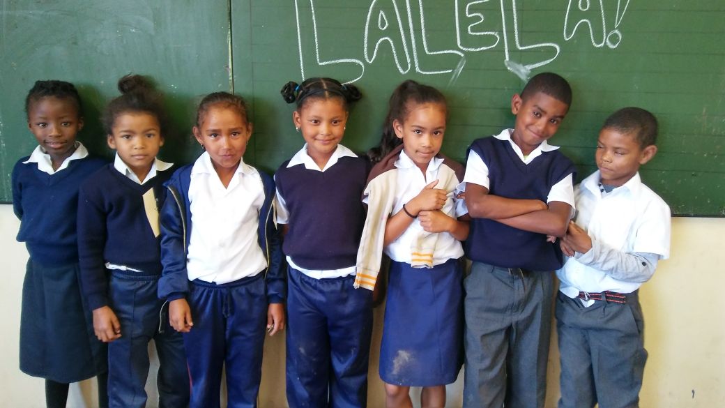 lalelaproject's tweet photo. New smiling faces at Lalela! Our Gr1 Learners at our new partner school, Disa Primary in Bonteheuwel on their first day of Lalela. Sponsor a class like this one by joining our #ClassCampaign at https://t.co/kR1iRPa8j6! https://t.co/d9FcAzI3C0