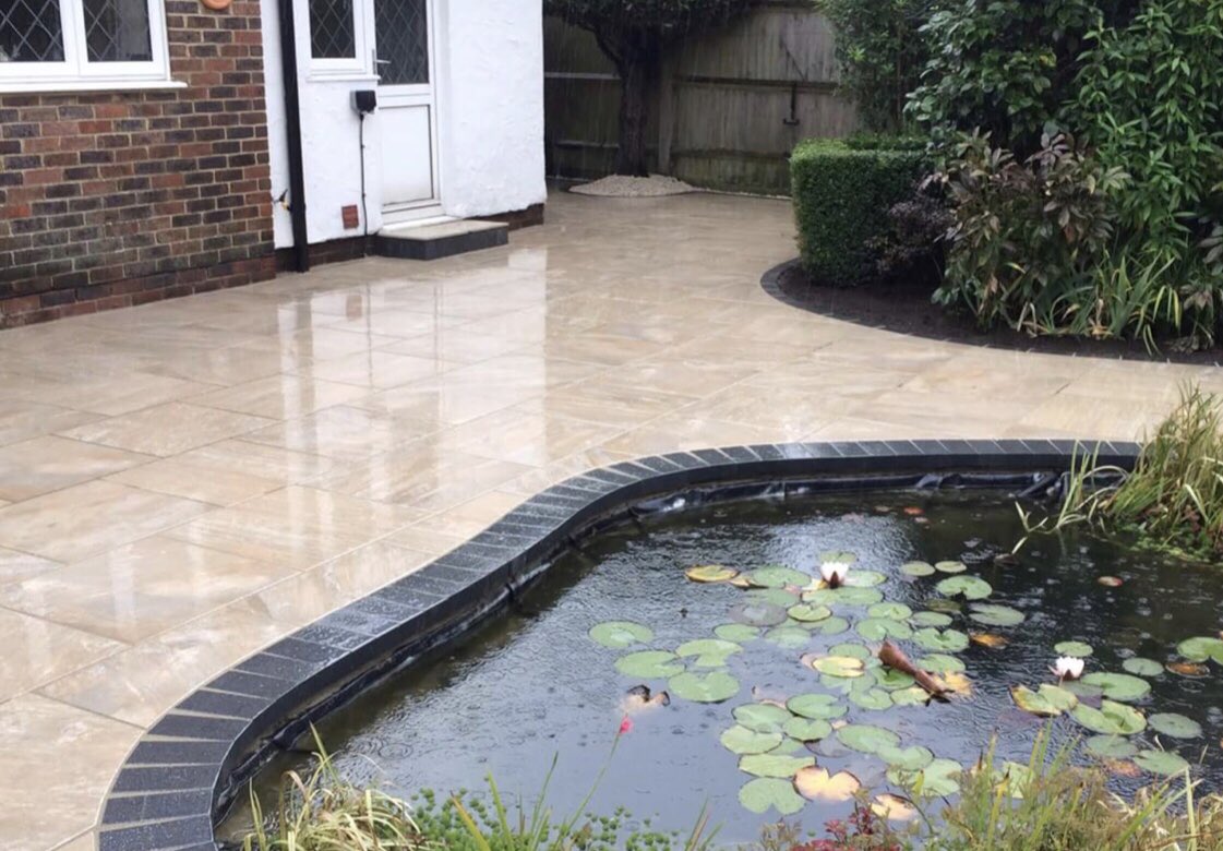 KeystonePaving's tweet image. What a transformation.  Porcelain patio with flamed granite edging, creating a nice contrast.  Porcelain supplied by @ChandlersBS