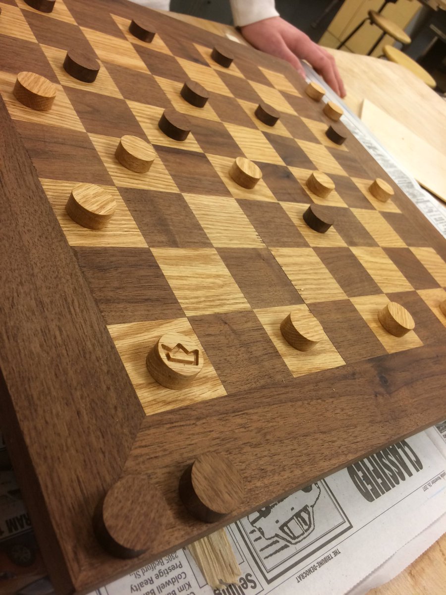 therealmrrudd's tweet photo. She’s trying out her fancy walnut/red oak checkerboard on a classmate. That X-carve did a fantastic job cutting out those pieces and adding the crown! #FCPSCTE https://t.co/6JG1F6aSLA