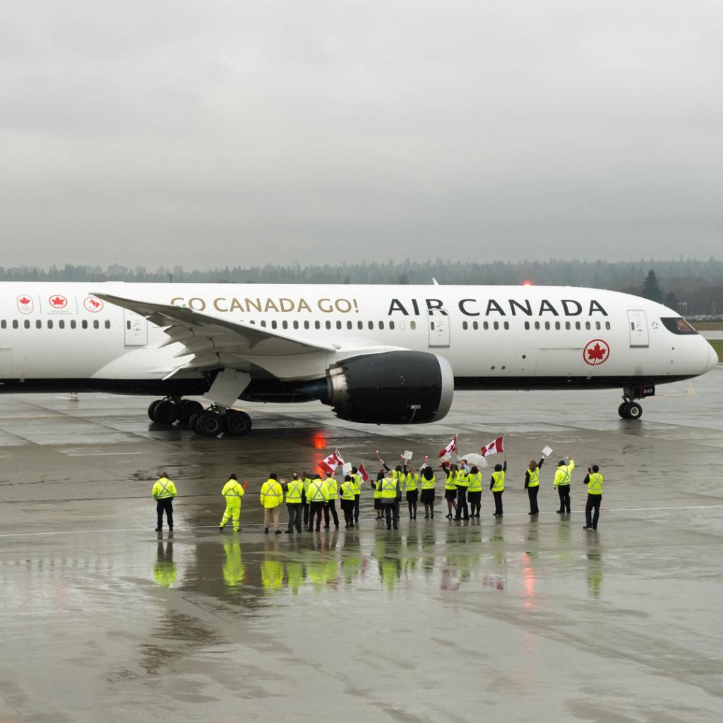 AirCanada's tweet photo. Bon voyage and good luck to @TeamCanada athletes en route to @pyeongchang2018 on flights AC61 and AC63! It’s an honour to welcome them aboard and can’t wait to cheer them on as they compete at the Olympic Winter Games. Go, Canada, go! #FlyTheFlag https://t.co/HXP1YLxA7g