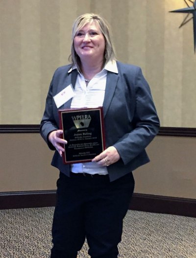 WPELRA's tweet photo. WPELRA President Joyce Roling delivering her farewell speech as she ends her WPELRA Presidency. Pictured below is Joyce recognized for her presidency by incoming WPELRA President Laura Belanger Tess.  #wpelra2018 https://t.co/tGCVxCEkDw