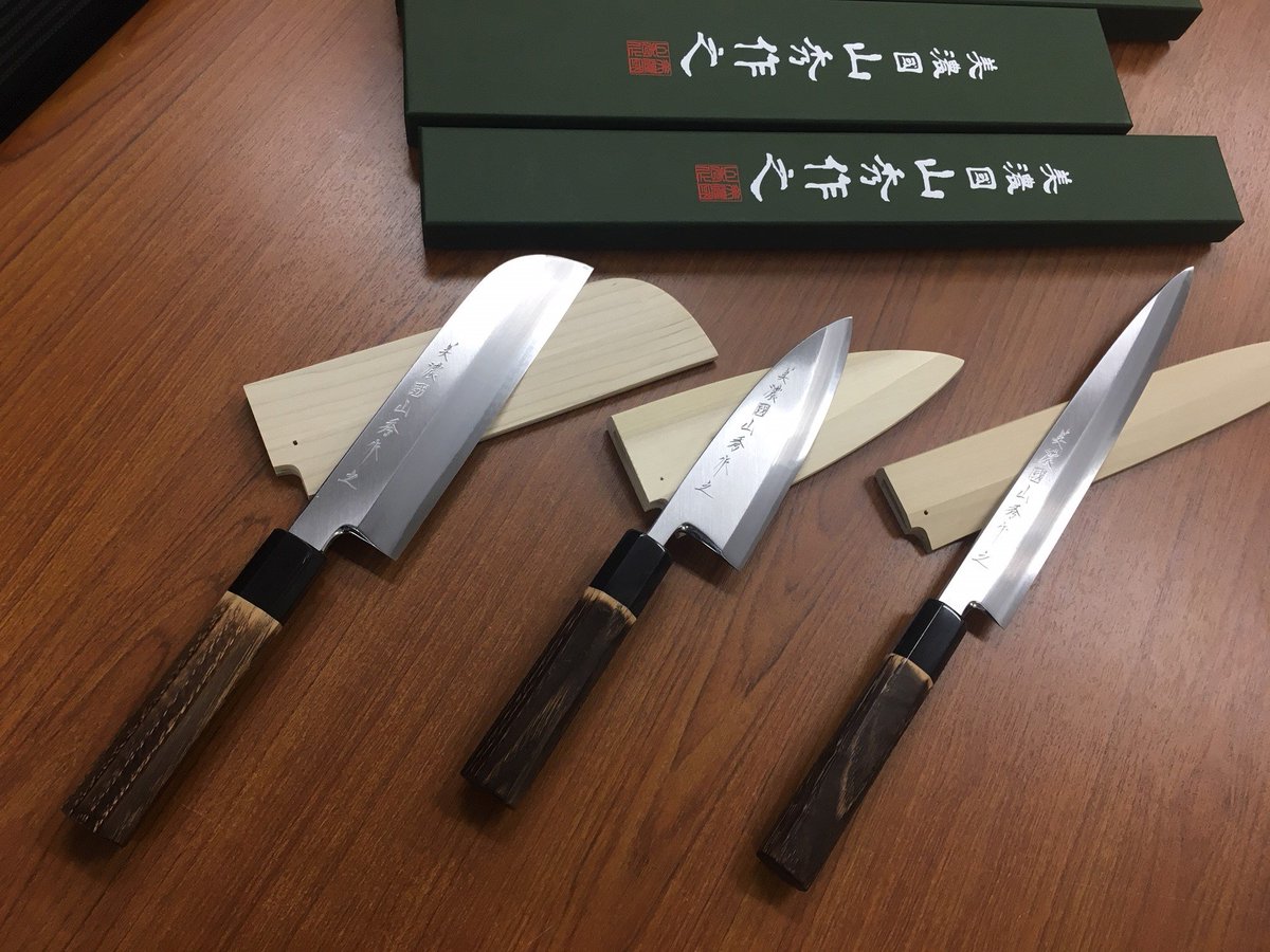 knifemerchant's tweet photo. Coming next week, our new Gin-San 3 Stainless steel knives. Hand crafted  by Minonokuni Artisans using the traditional methods of coal burning  ovens and hammering. The chestnut handles are flame-licked for  appearance and increased hardness. More at https://t.co/0zAN3ul3fG https://t.co/s1F55UX6TX
