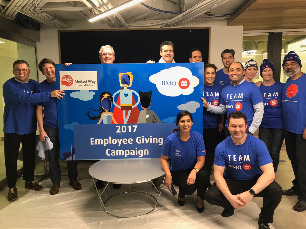 BMO BC leadership team celebrating a successful employee giving campaign.  Getting ready for the pie toss!