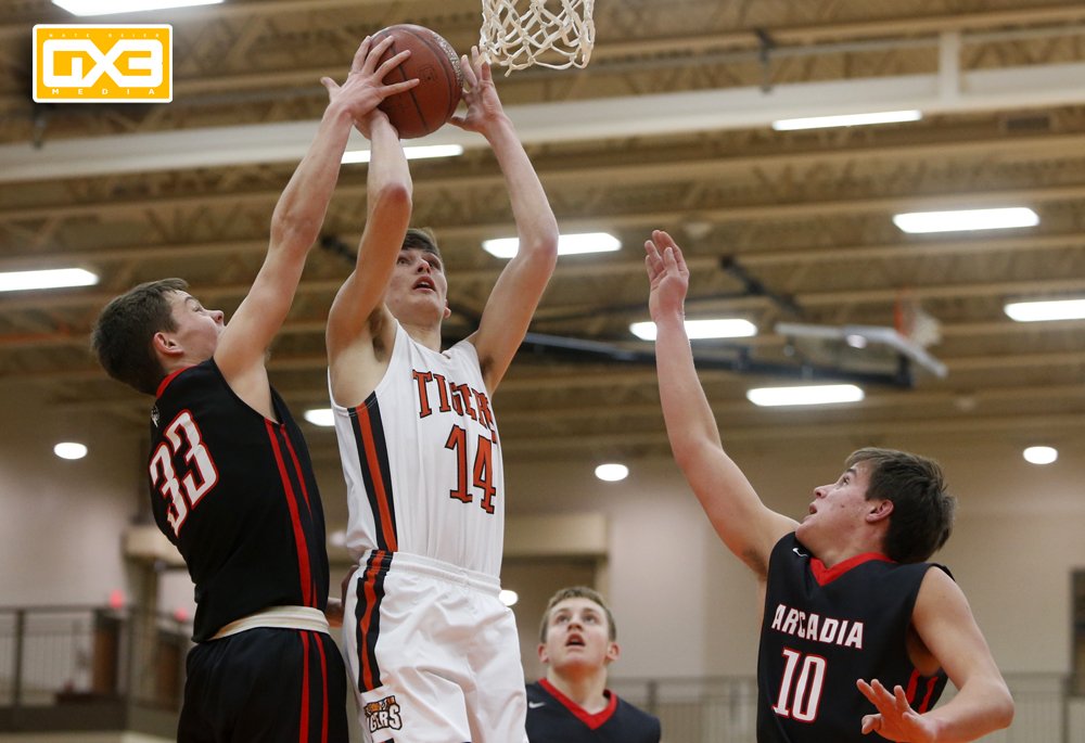 NBGX3Media's tweet photo. SHOT INTERRUPTED #brftigers' Jacob Woods has a shot blocked by #arcadiaraiders' Nolan Martin during first half of Thursday's game https://t.co/kkDt1ymq3q