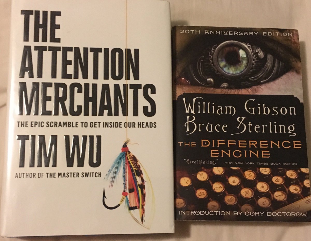 Two books side-by-side: “The Attention Merchants” by Tim Wu and “The Difference Engine” by William Gibson