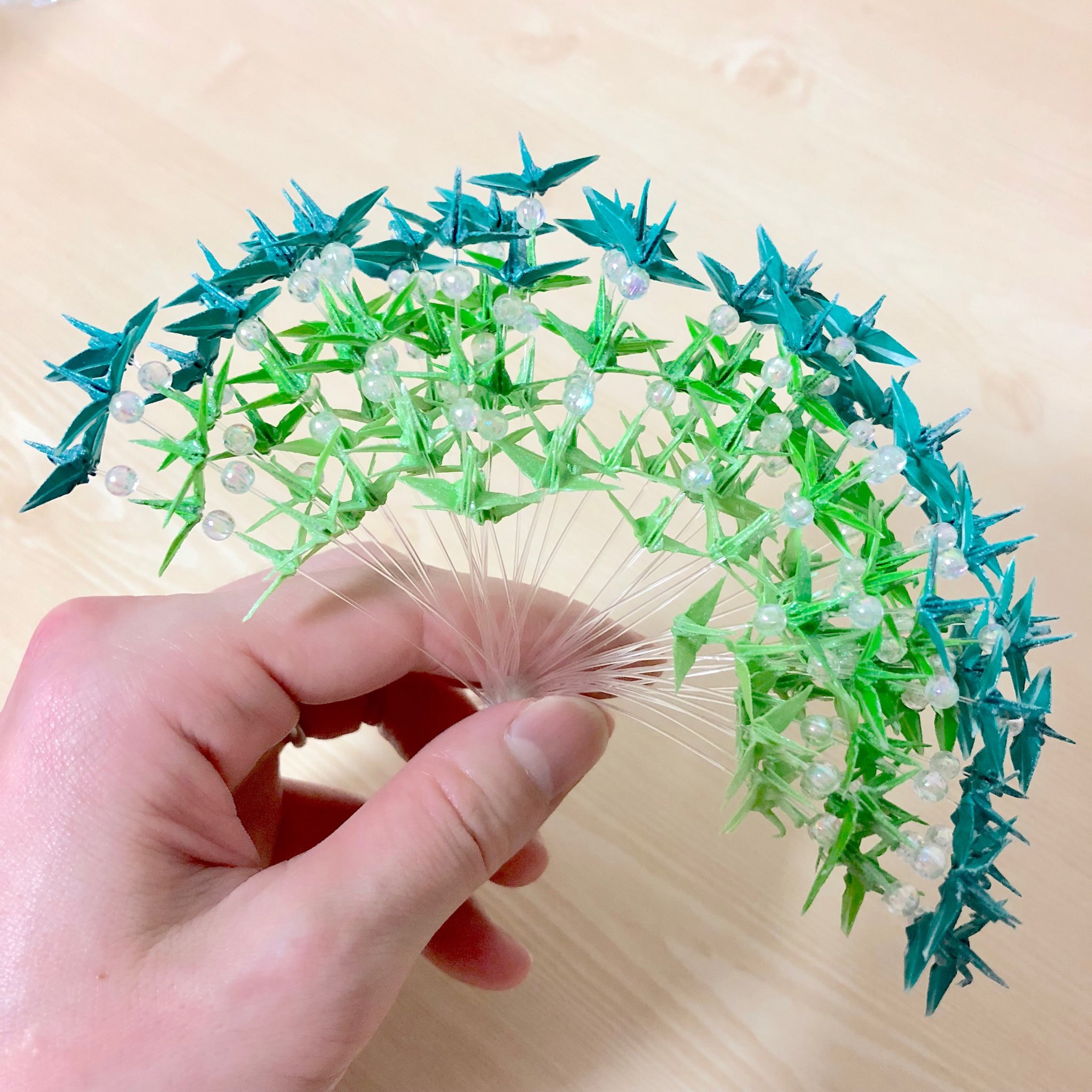 レースでできた鶴みたい！ 折り鶴×切り絵が融合したアート「桜