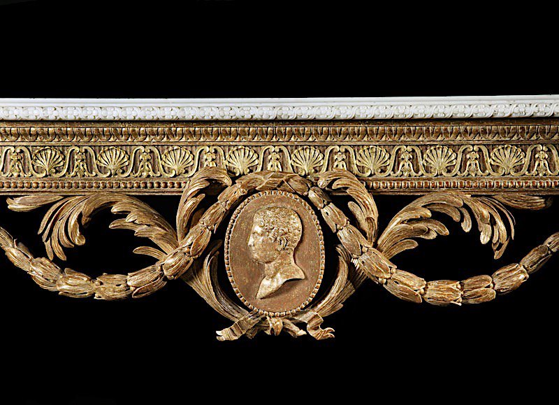A George III giltwood side table with a Roman specimen marble top. The giltwood base closely follows the two designs by John Linnell. View today at The Winter Antiques Show until Sunday at The Park Avenue Armory. Booth 3.