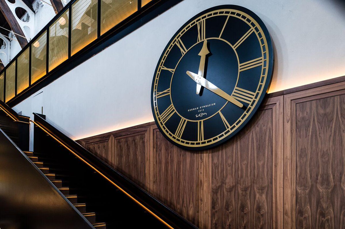 SmithofDerby's tweet photo. Finished in graphite black and custom metallic gold, @TheGermanGym clock reflects the building's heritage of the mid-1800s. Installed 2015. #FlashbackFriday #clock #restaurant #interior #interiorclock #london https://t.co/4WzpkoZVqI
